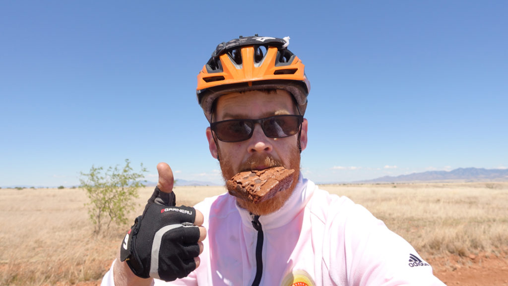 Derrick Perrin snacks on the Arizona trail
